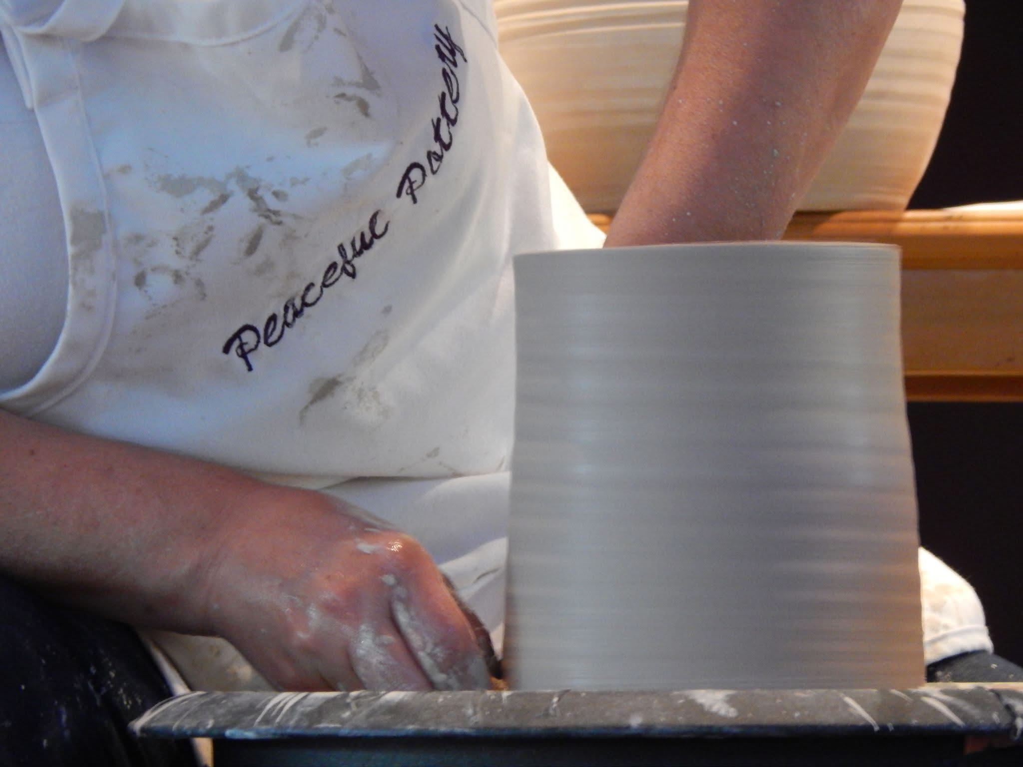 Nancy Harbron working with clay at the pottery wheel