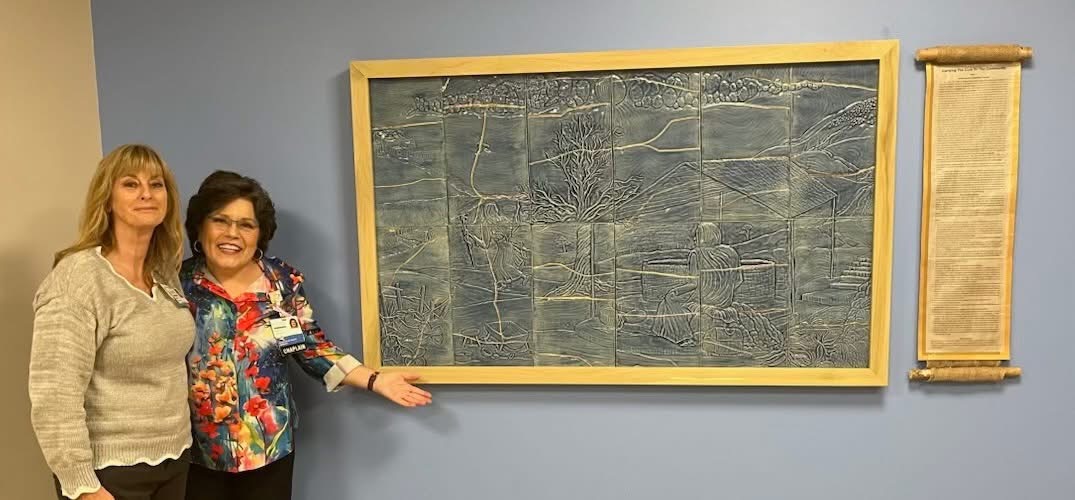 The Samaritan Woman, large-scale ceramic narrative relief installed at a hospital employee entrance in 2024